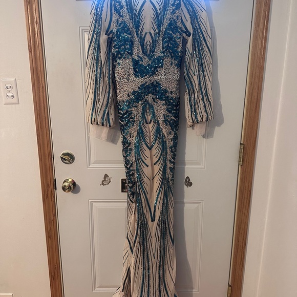 Elegant Sheer Illusion Gown with Teal Sequin Accents - Picture 10 of 11